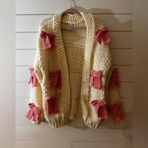 Elegant Cream Cardigan with Pink Bows